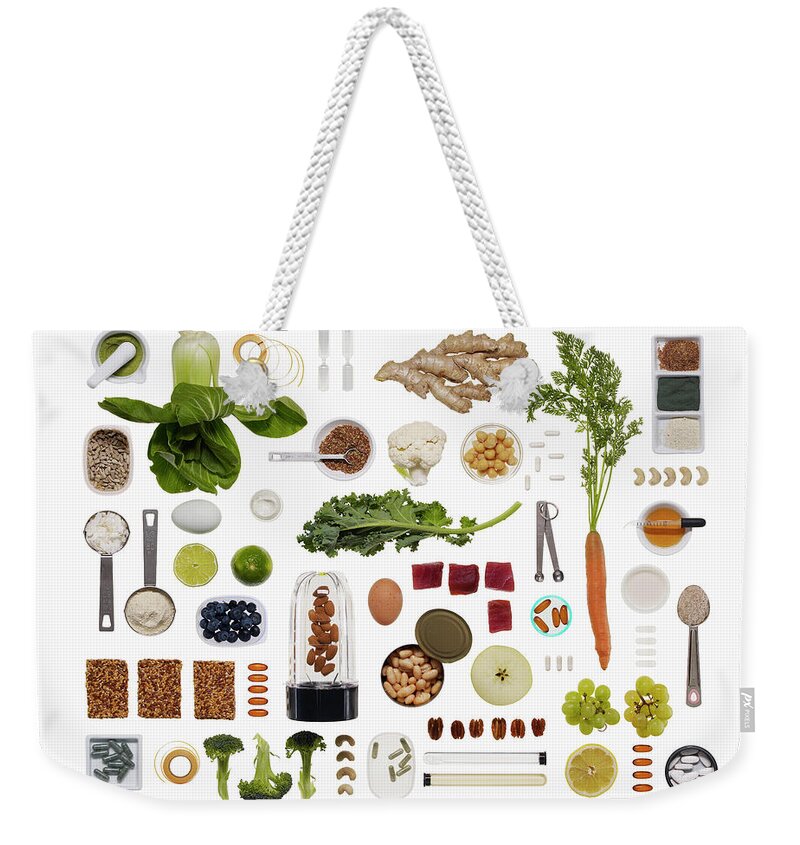 White Background Weekender Tote Bag featuring the photograph A Healthy Diet Food Grid by Dwight Eschliman