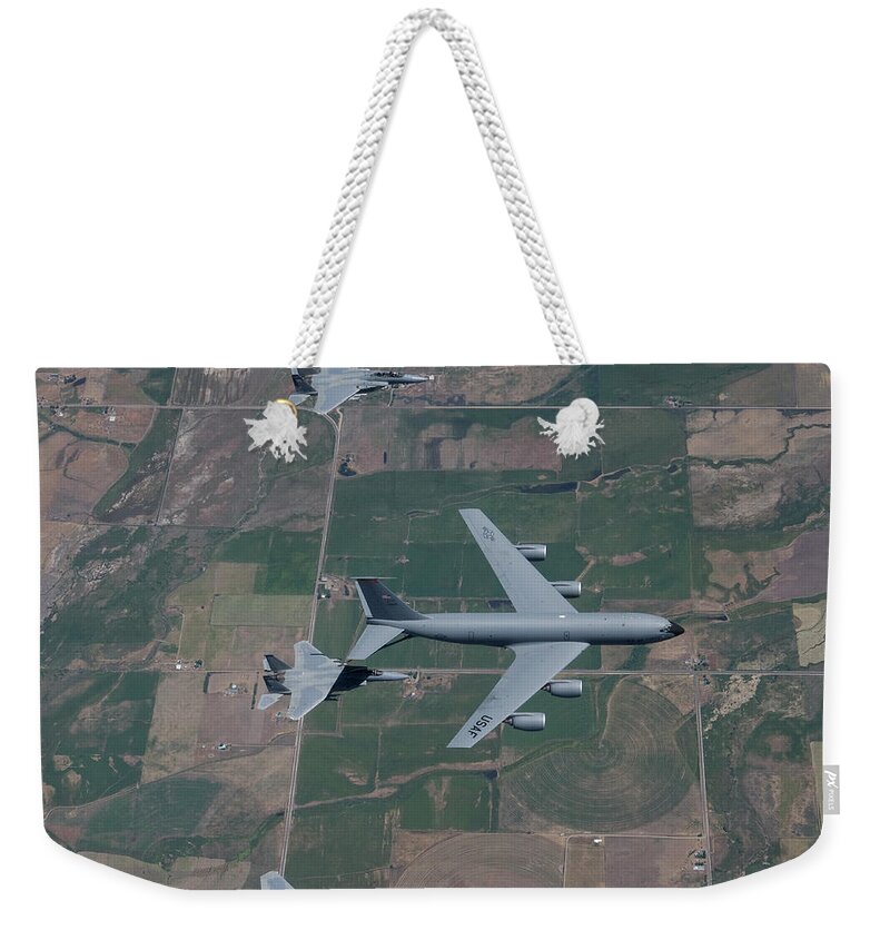 Five Objects Weekender Tote Bag featuring the photograph A Kc-135r Stratotanker Refuels Four by High-g Productions/stocktrek Images