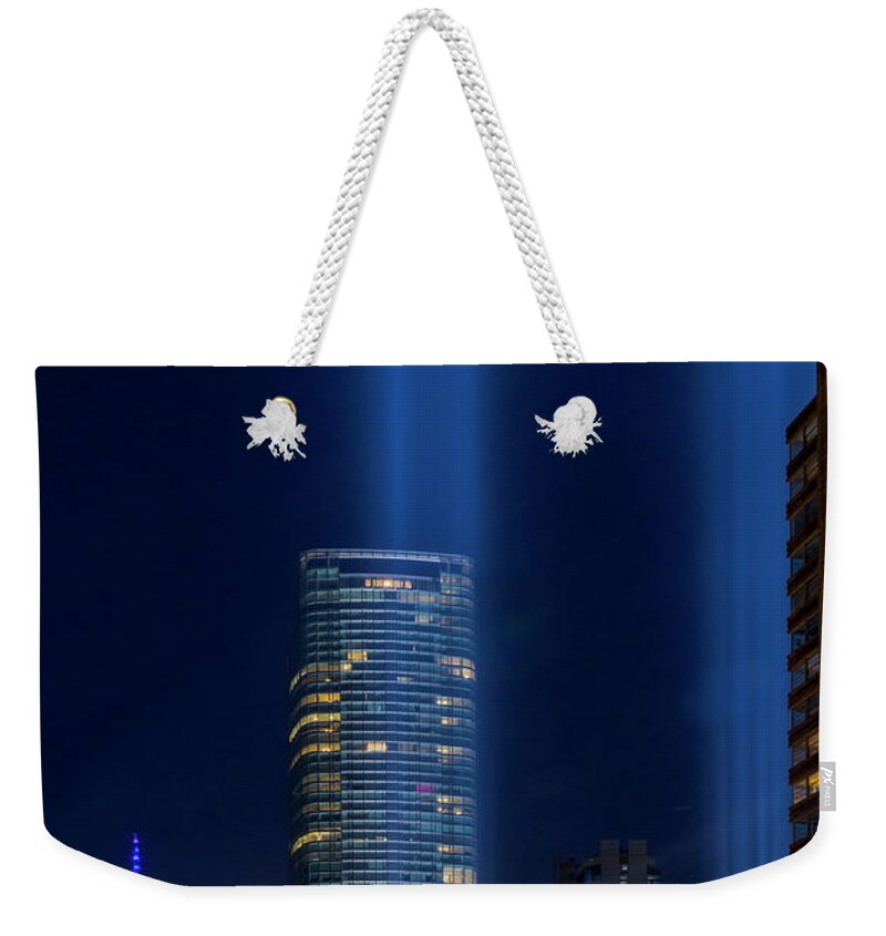 World Trade Center Weekender Tote Bag featuring the photograph A NYC 911 Tribute In light by Susan Candelario
