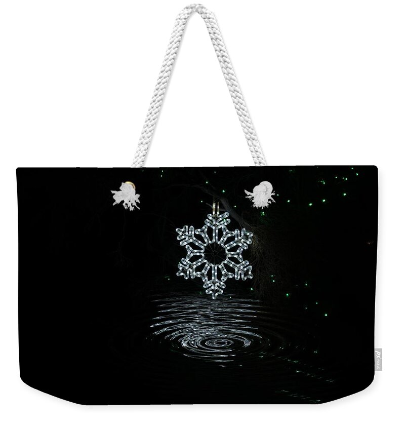 Snowflake Weekender Tote Bag featuring the photograph A Ripple of Christmas Cheer by Colleen Cornelius