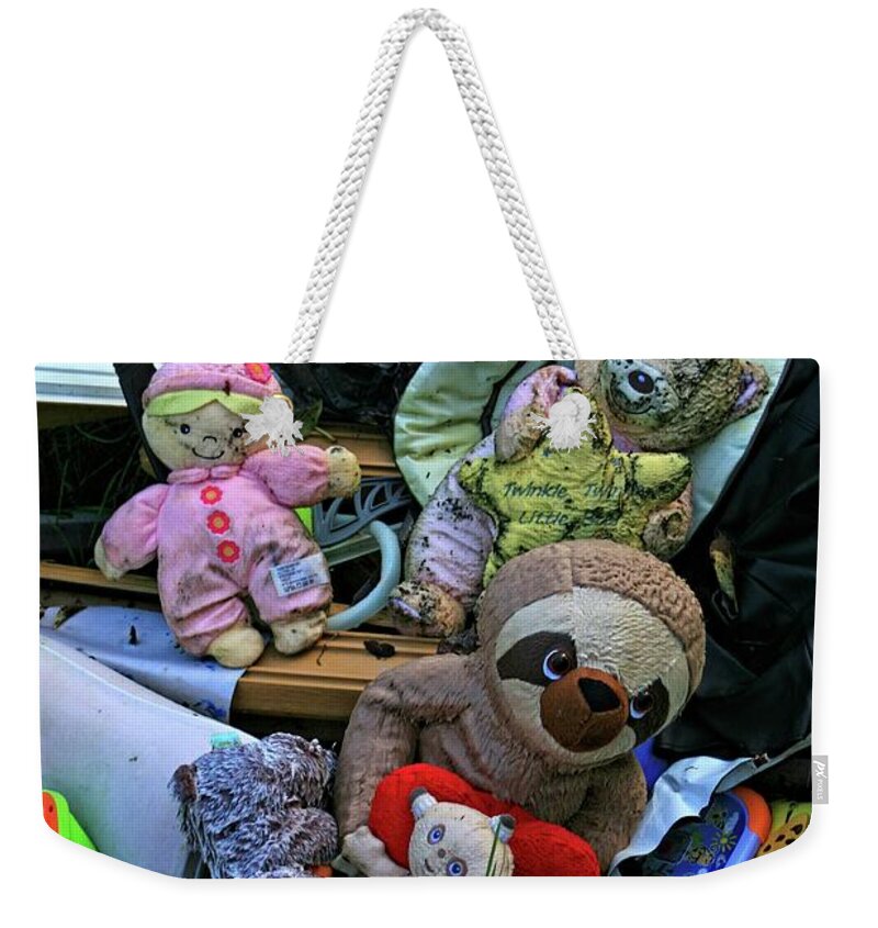 Abandoned Toys Weekender Tote Bag featuring the photograph Abandoned toys by Martin Smith