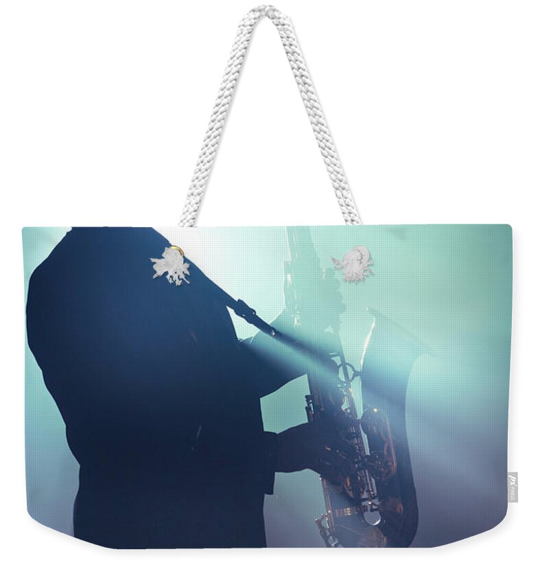 Concert Weekender Tote Bag featuring the photograph Afro-american Musician With Hazy by Tooga