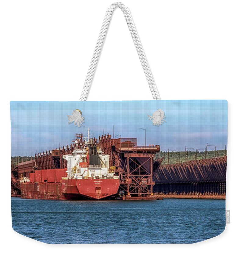 Agate Bay Weekender Tote Bag featuring the photograph Agate Bay Docks by Susan Rissi Tregoning