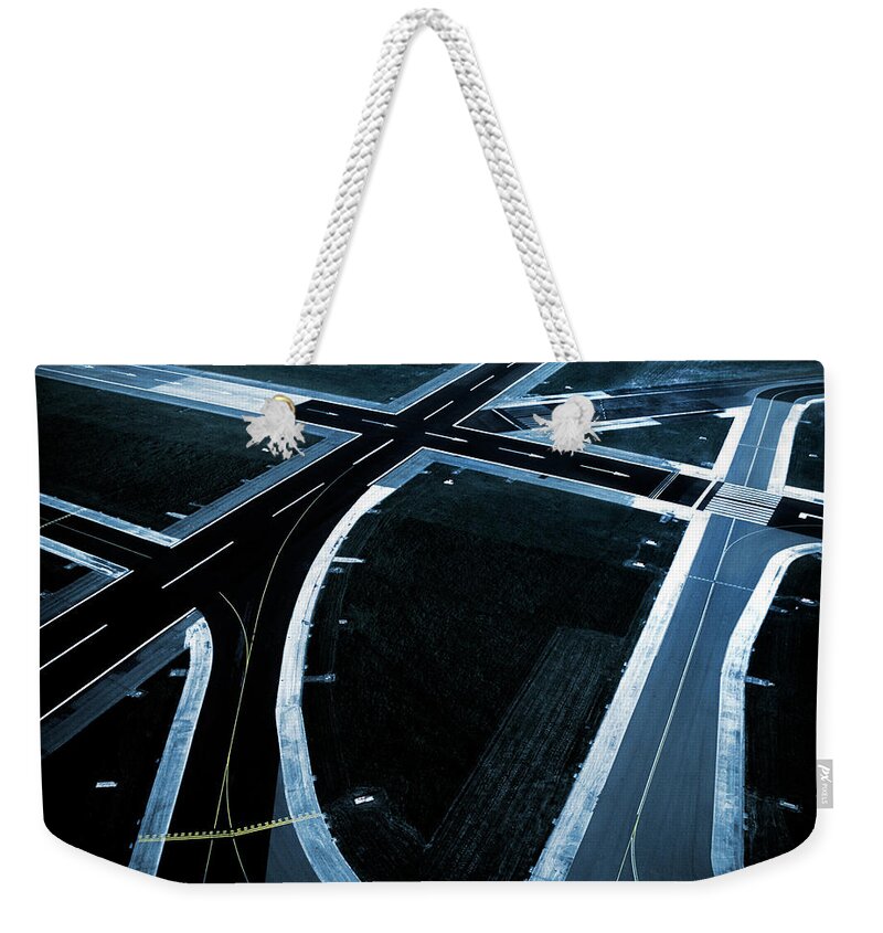 Netherlands Weekender Tote Bag featuring the photograph Airport Runways 05 by Maarten Wouters