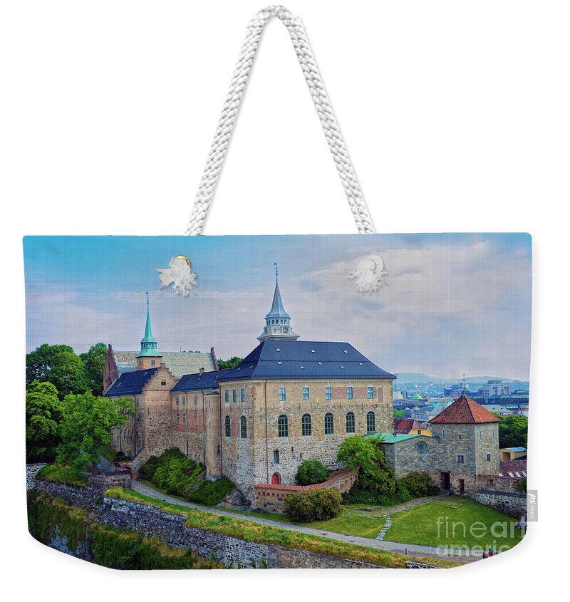 Akershus Fortress Weekender Tote Bag featuring the photograph Akershus Fortress in Oslo by Catherine Sherman