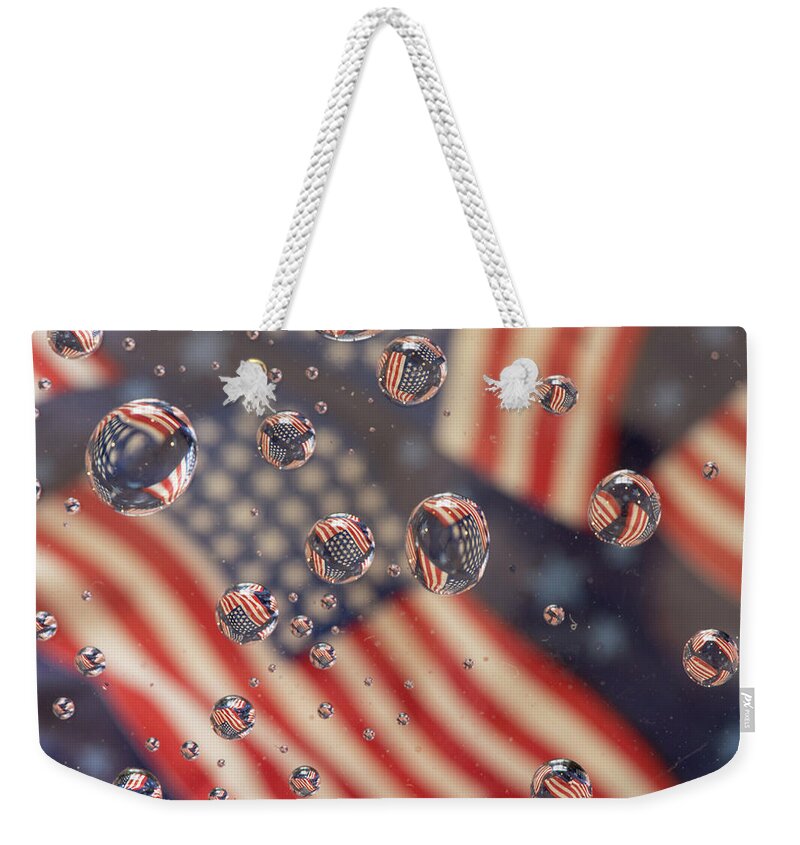 American Flag Weekender Tote Bag featuring the photograph American flag by Minnie Gallman