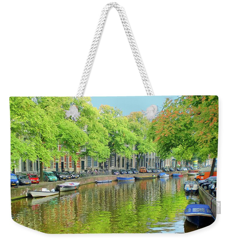 Travel Weekender Tote Bag featuring the photograph Amsterdam by Sylvan Rogers