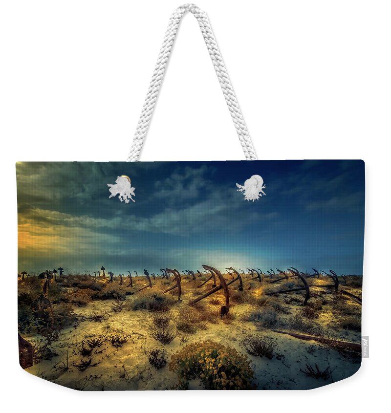 Anchors Graveyard Weekender Tote Bag featuring the photograph Anchors drop by Micah Offman