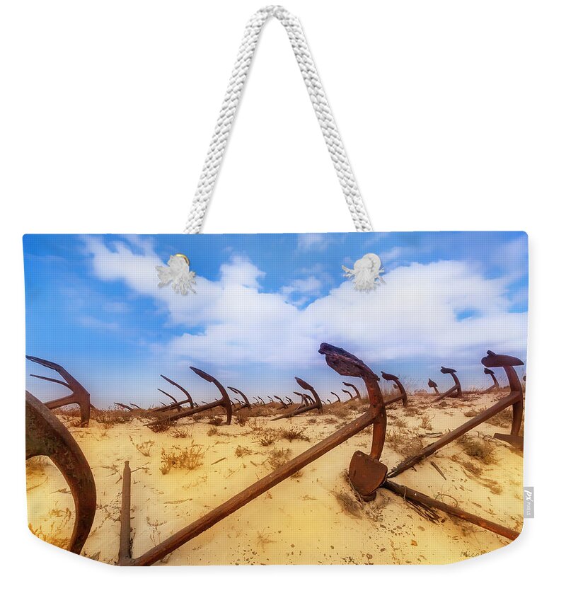 Anchors Graveyard Weekender Tote Bag featuring the photograph Anchors graveyard by Micah Offman