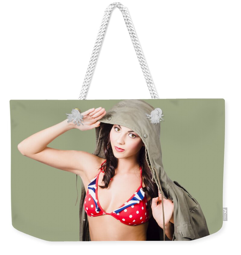 Army Weekender Tote Bag featuring the photograph Army pinup saluting retro fashion in 1940 style by Jorgo Photography