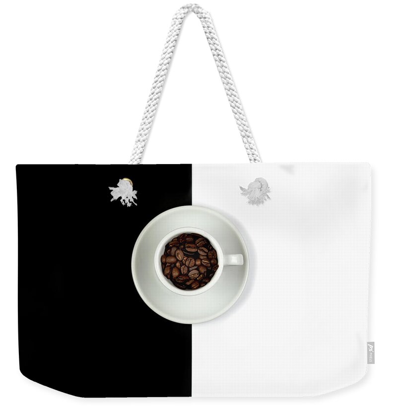 Still-life Weekender Tote Bag featuring the photograph Aromatic Coffee beans on the pot by Michalakis Ppalis