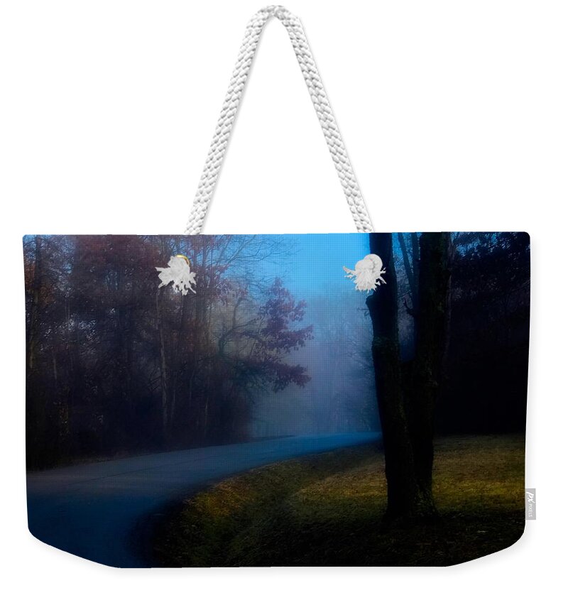  Weekender Tote Bag featuring the photograph Around the Curve by Jack Wilson