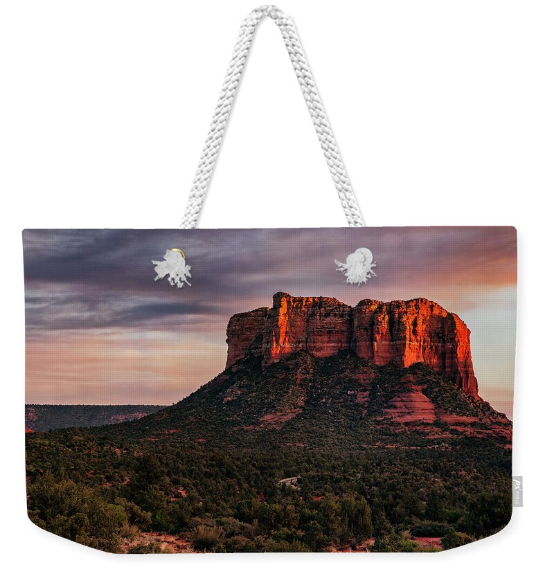 Sedona Weekender Tote Bag featuring the photograph As The Sun Sets On Courthouse Butte by Saija Lehtonen