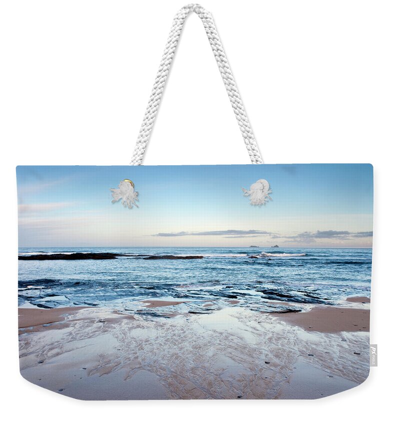 Water's Edge Weekender Tote Bag featuring the photograph Atlantic Ocean Surf And Beach Scene by Racheldewis