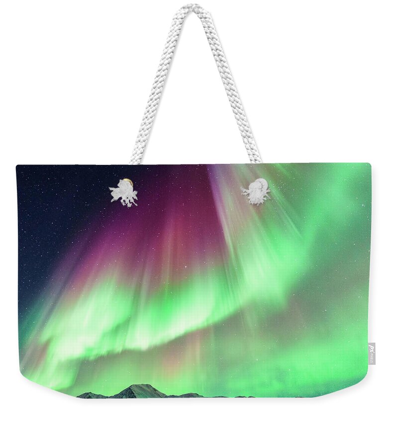 Scenics Weekender Tote Bag featuring the photograph Aurora Borealis In Alaska by Noppawat Tom Charoensinphon