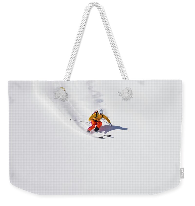 Ski Pole Weekender Tote Bag featuring the photograph Austria, Young Woman Doing Alpine Skiing by Westend61