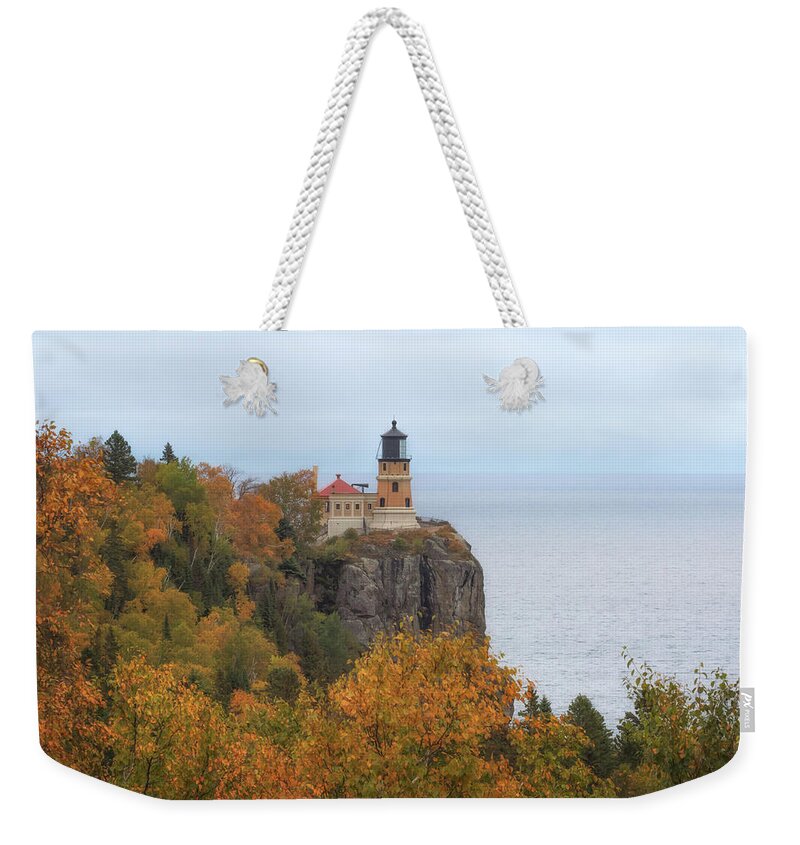 Lighthouse Weekender Tote Bag featuring the photograph Autumn at Split Rock Lighthouse by Susan Rissi Tregoning