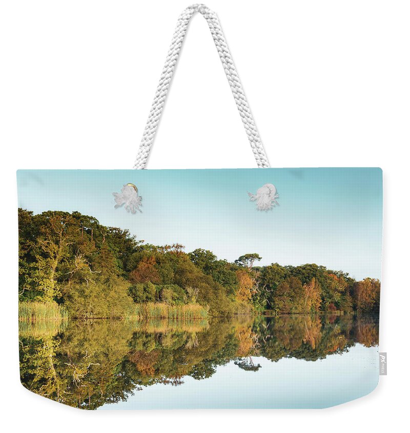 Lake Weekender Tote Bag featuring the photograph Autumnal Reflections by Tanya C Smith