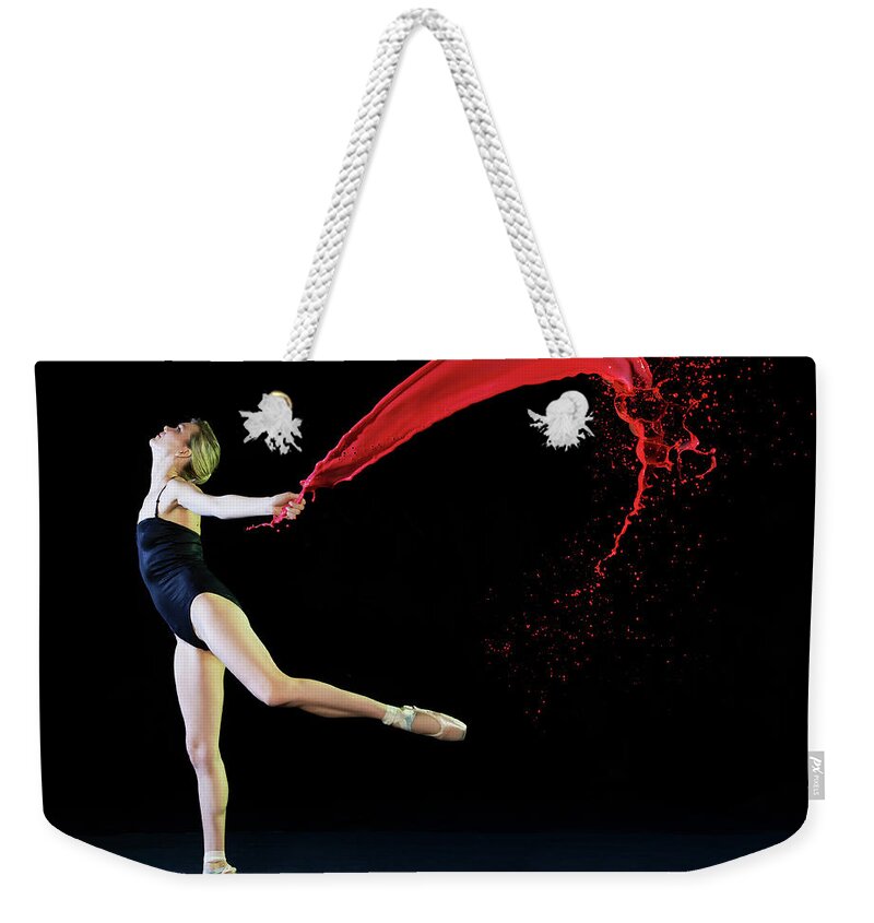 Ballet Dancer Weekender Tote Bag featuring the photograph Ballet Dancer Dancing With Red Paint by Tara Moore