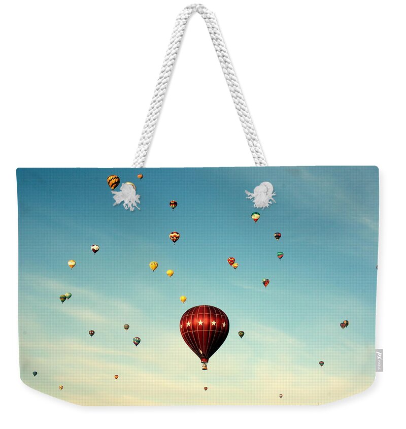 Celebration Weekender Tote Bag featuring the photograph Balloon Fiesta by Elizabeth O. Weller
