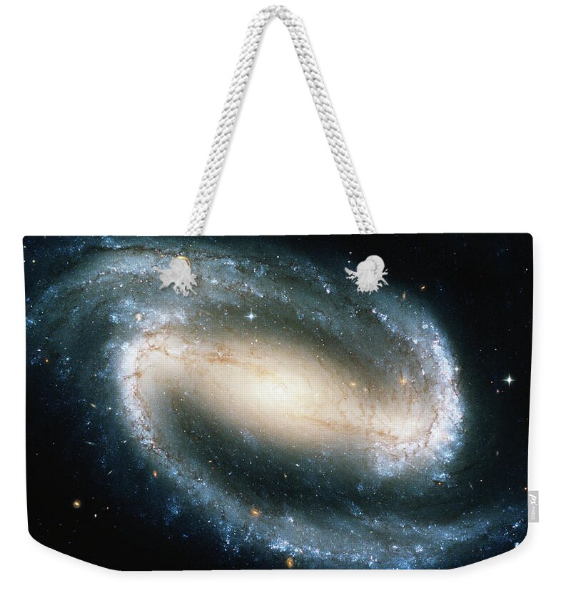 Spiral Galaxy Weekender Tote Bag featuring the photograph Barred Spiral Galaxy Ngc 1300 by Stocktrek
