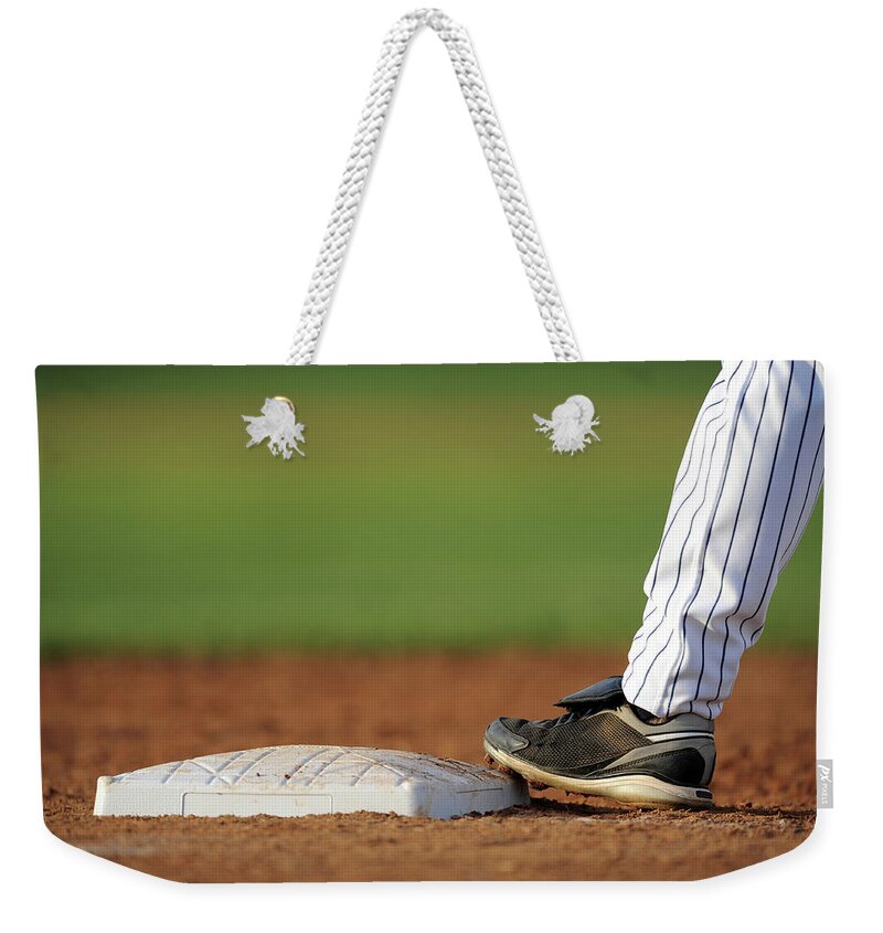 Child Weekender Tote Bag featuring the photograph Baseball Player by Matt brown