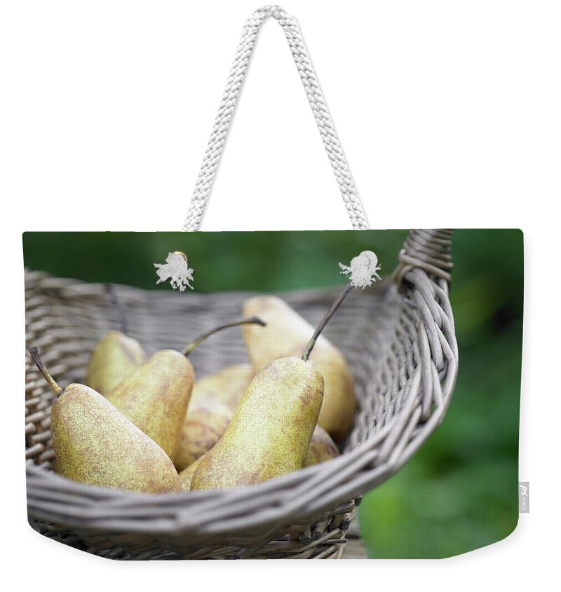 Outdoors Weekender Tote Bag featuring the photograph Basket Of Freshly Picked Pears by Dougal Waters