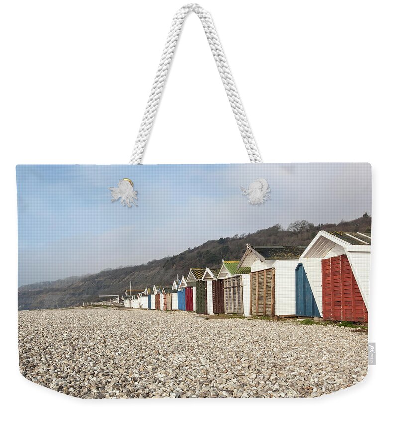 Beach Hut Weekender Tote Bag featuring the photograph Beach Huts At Lyme Regis, Dorset by Nick Cable