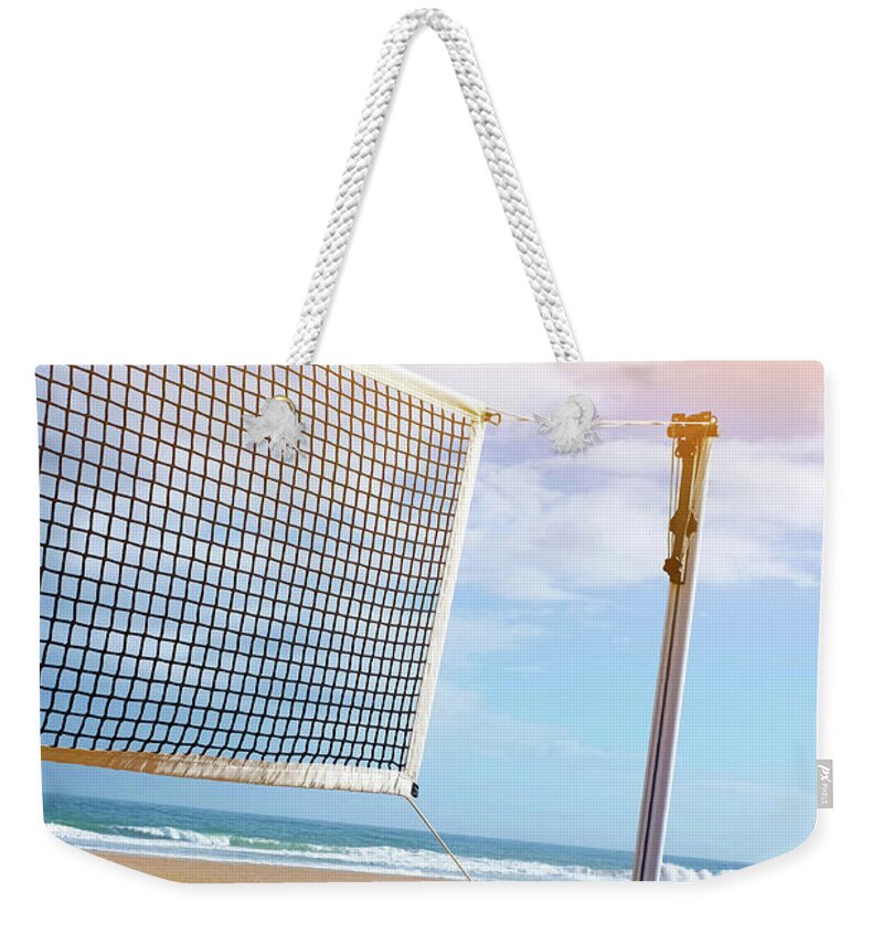 Action Weekender Tote Bag featuring the photograph Beach Volley by Carlos Caetano