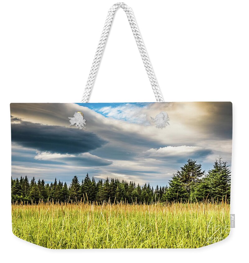 Countryside Weekender Tote Bag featuring the photograph Beautiful sky over Lake Clark National Park, Alaska by Lyl Dil Creations