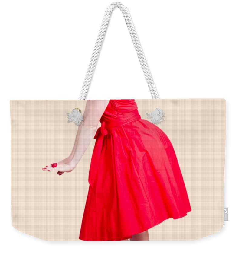 Fashion Weekender Tote Bag featuring the photograph Beautiful woman model in red dress and high heels by Jorgo Photography