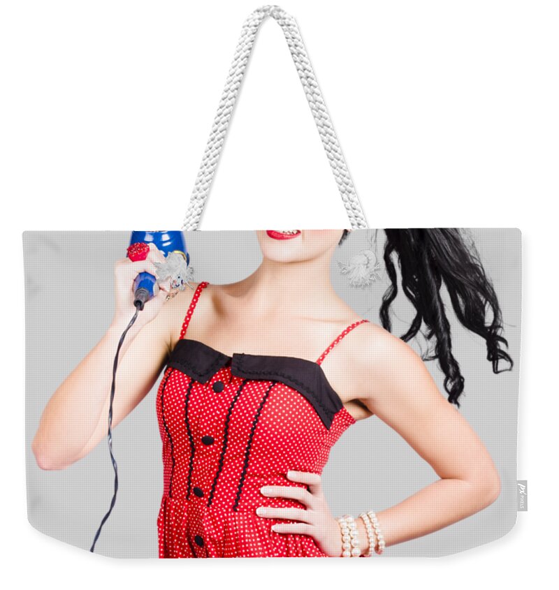 Salon Weekender Tote Bag featuring the photograph Beauty style portrait of a elegant hairdryer woman by Jorgo Photography