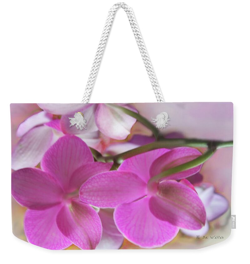 Flower Weekender Tote Bag featuring the photograph Behind the Orchid by Bonnie Willis