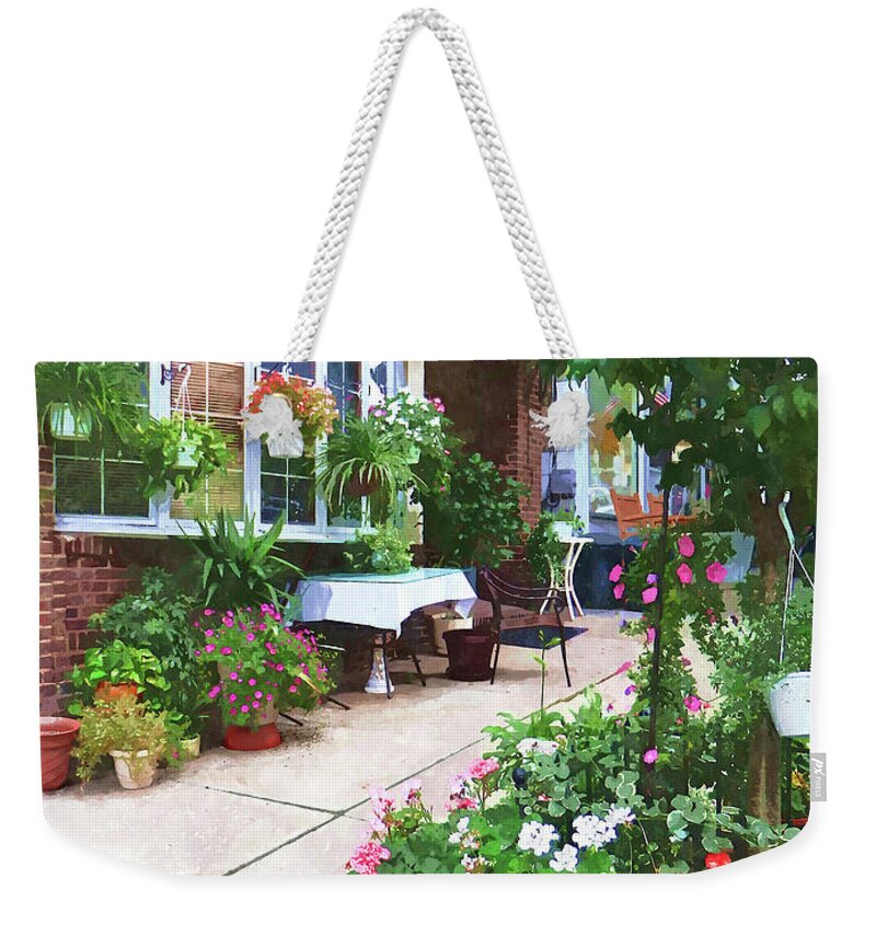 Cafe Weekender Tote Bag featuring the photograph Belvidere NJ - Outdoor Cafe with Flowerpots by Susan Savad