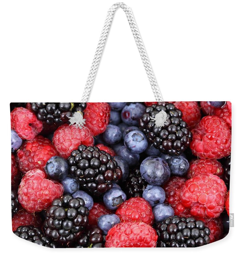 Food Weekender Tote Bag featuring the photograph Berries of the forest by Top Wallpapers