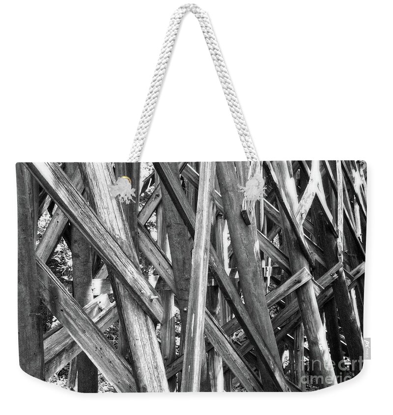 Black And White Weekender Tote Bag featuring the photograph Black And White Wooden Structure by Phil Perkins