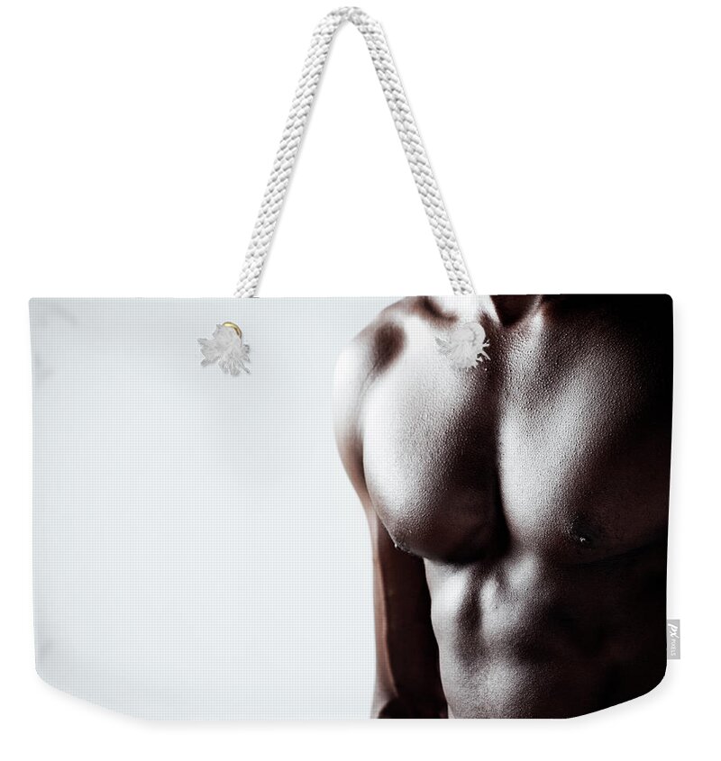 Abdominal Muscle Weekender Tote Bag featuring the photograph Black Power by Goldmund