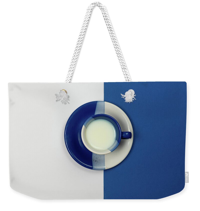 Coffee Weekender Tote Bag featuring the photograph Blue and White coffee mug with fresh milk by Michalakis Ppalis