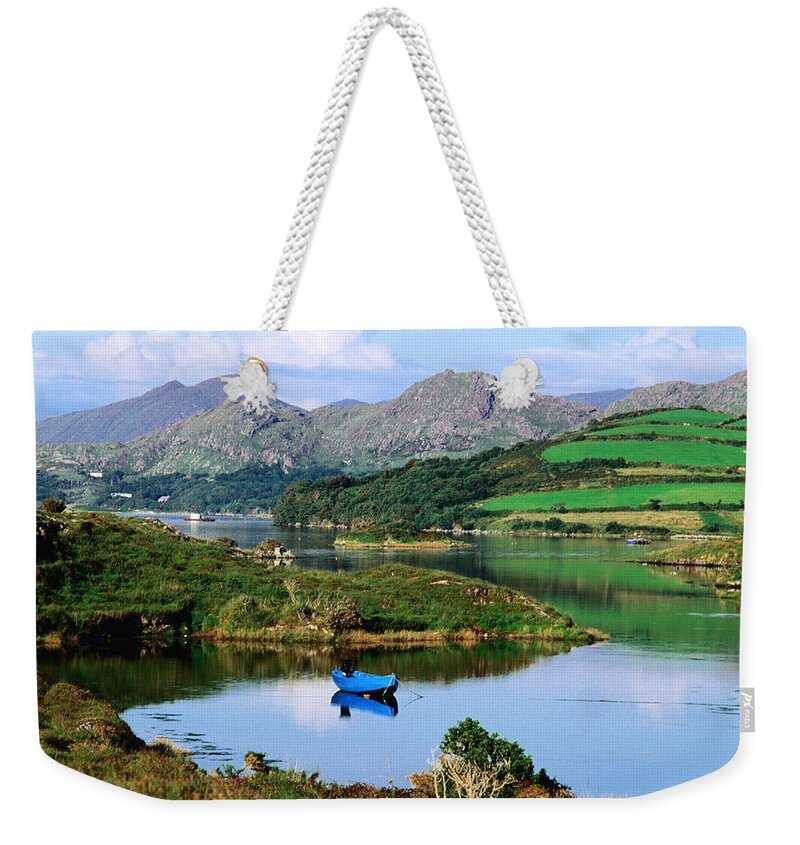 Tranquility Weekender Tote Bag featuring the photograph Blue Boat On Tranquil Kenmare River by John Banagan