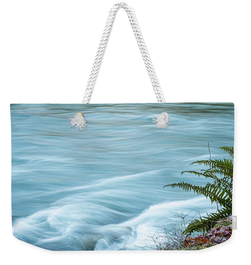 Landscapes Weekender Tote Bag featuring the photograph Blue River Flows By by Claude Dalley