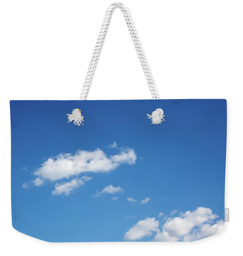 Sparse Weekender Tote Bag featuring the photograph Blue Sky by Donnichols