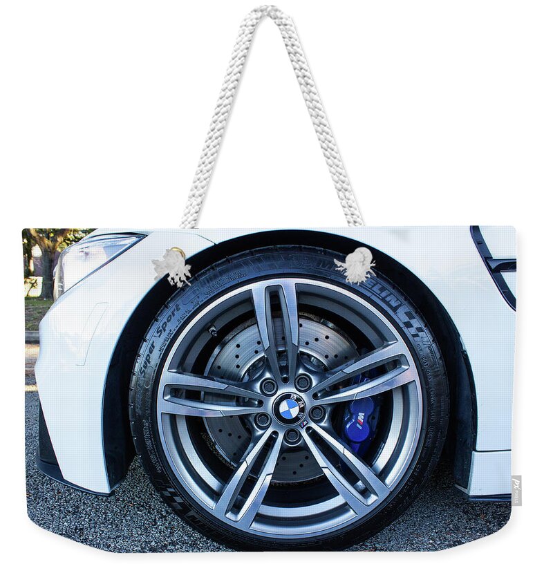 Bmw M4 Wheel Weekender Tote Bag featuring the photograph BMW M4 Wheel by Rocco Silvestri