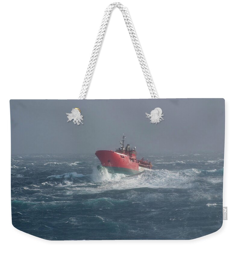 Wind Weekender Tote Bag featuring the photograph Boat At Sea In Storms by Mikeuk