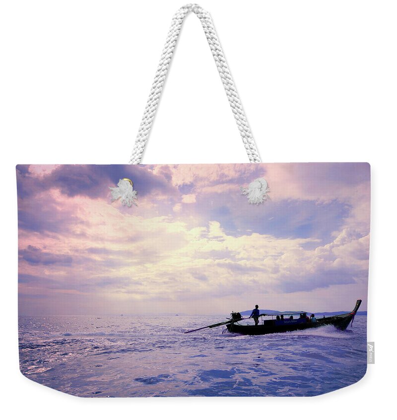 Tranquility Weekender Tote Bag featuring the photograph Boat On Ocean by Sharon Lapkin
