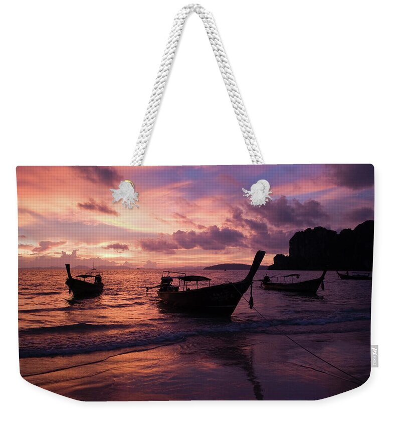 Tranquility Weekender Tote Bag featuring the photograph Boats On Ko Phi Phi Island by Essai