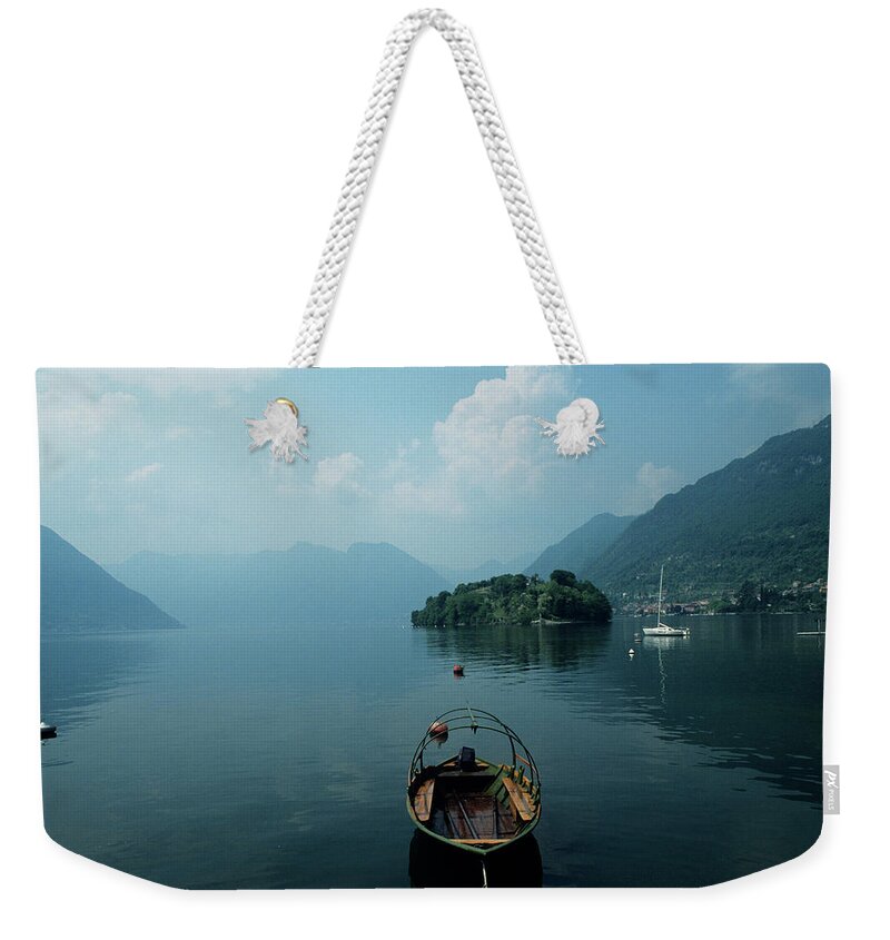 Tremezzo Weekender Tote Bag featuring the photograph Boats On Lake, Tremezzo, Lake Como by Andy Sotiriou