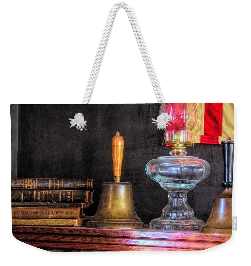  Weekender Tote Bag featuring the photograph Books and Bells by Jack Wilson