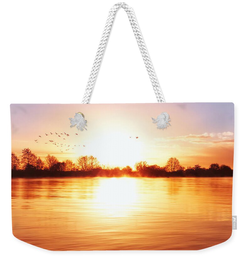 Sun Weekender Tote Bag featuring the photograph Born in fire by Jaroslav Buna