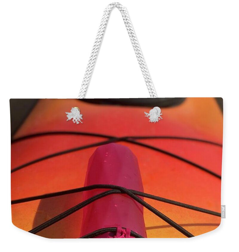 Kayak Weekender Tote Bag featuring the photograph Bottle on a Boat by Lora J Wilson