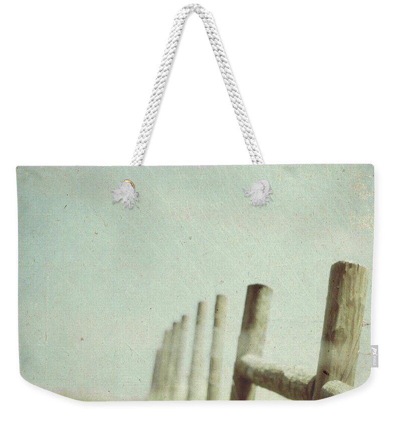 Tranquility Weekender Tote Bag featuring the photograph Boundaries by Dawn D. Hanna
